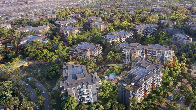 a bird's eye view of a city with lots of trees