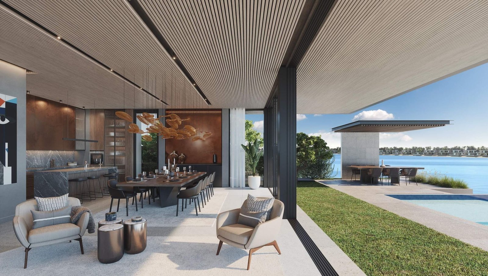 a living room and dining room with a view of the water